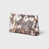 JONES + CO small envelope clutch with a watercolor abstract floral print and a secure hinge closure.