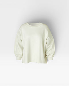 JONES + CO Fond Sweatshirt in dirty white cotton, featuring drop shoulders, raw hem, and distressed details.