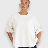JONES + CO Rachel Comey Fond crewneck sweatshirt in dirty white with drop shoulders and raw edge hemline