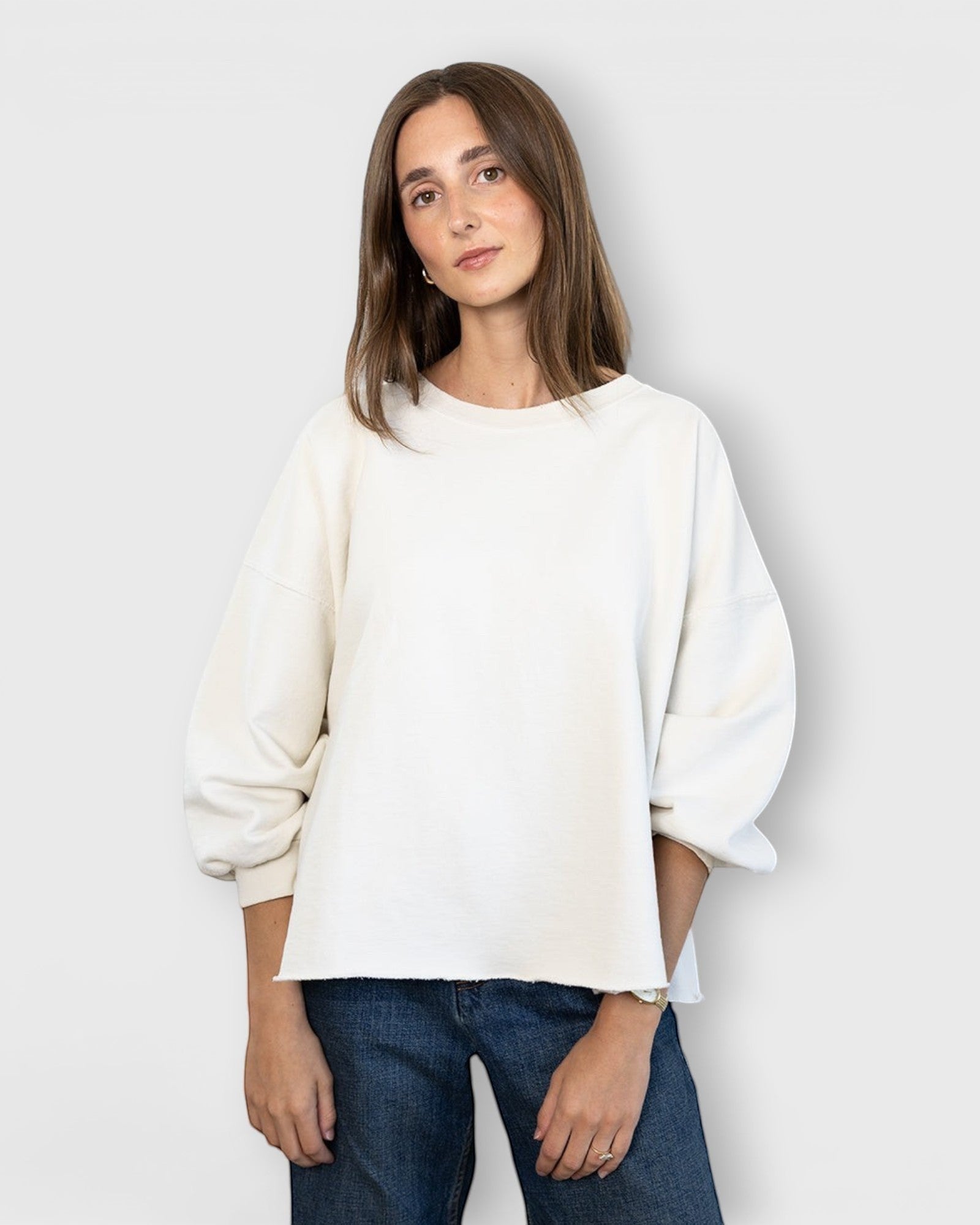 JONES + CO Rachel Comey Fond crewneck sweatshirt in dirty white with drop shoulders and raw edge hemline
