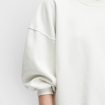 JONES + CO Rachel Comey Fond crewneck sweatshirt in dirty white with drop shoulders and raw edge hemline
