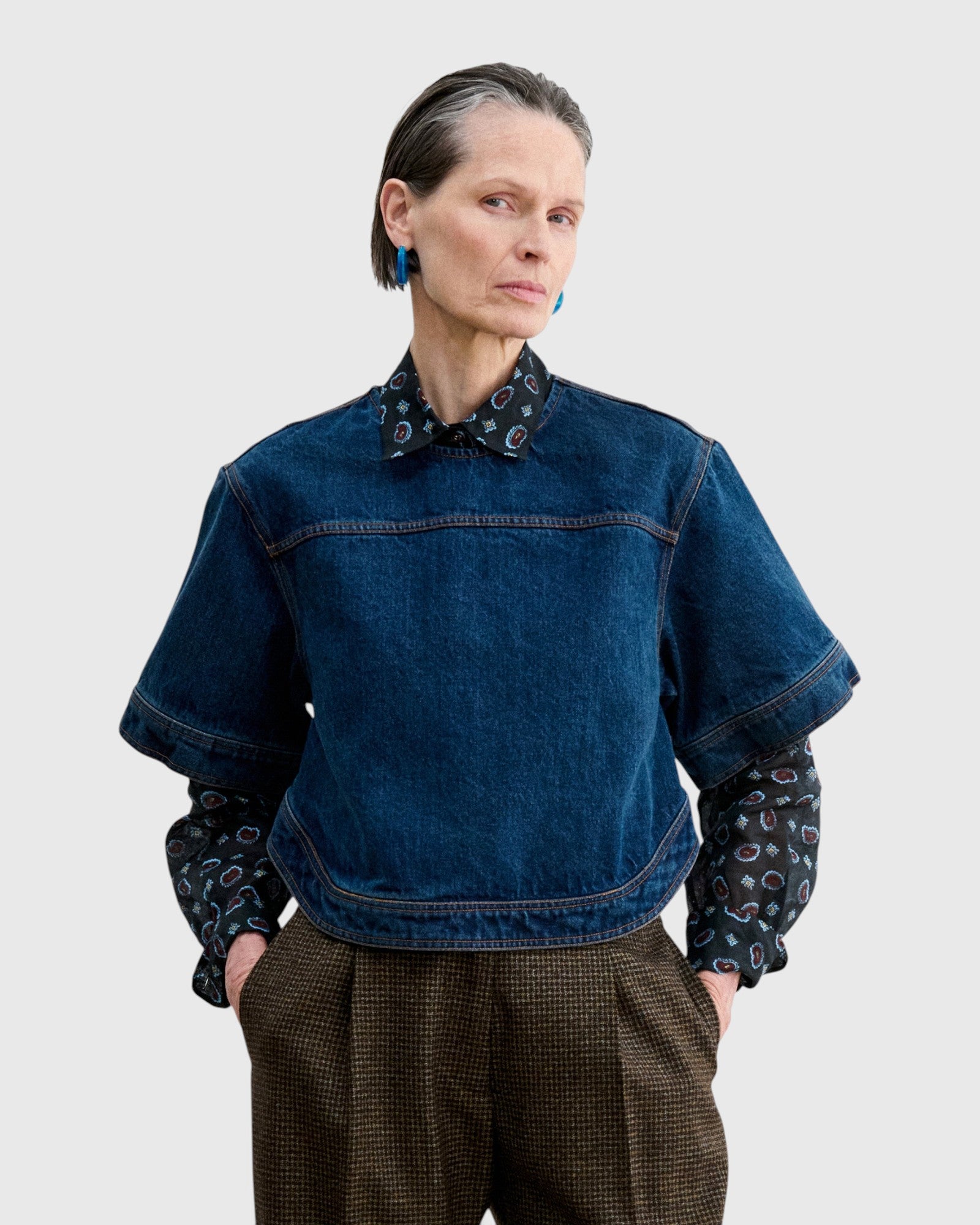 JONES + CO Fort Top in muddy indigo denim with a boxy silhouette, short sleeves, and back keyhole detail.