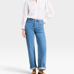 JONES + CO Francesca white voile blouse with oversized collar, pintucked placket, and ruffled cuffs on a model