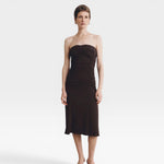 JONES + CO Gaia strapless midi dress in espresso. Fitted silhouette with ruched detailing on the side.