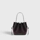 JONES + CO Mini Scallop Tote in dark brown ganache suede with a sculptural silhouette and silver-tone hardware.