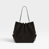 JONES + CO Scallop Tote in rich ganache brown suede with a spacious design and elegant scalloped top edge.