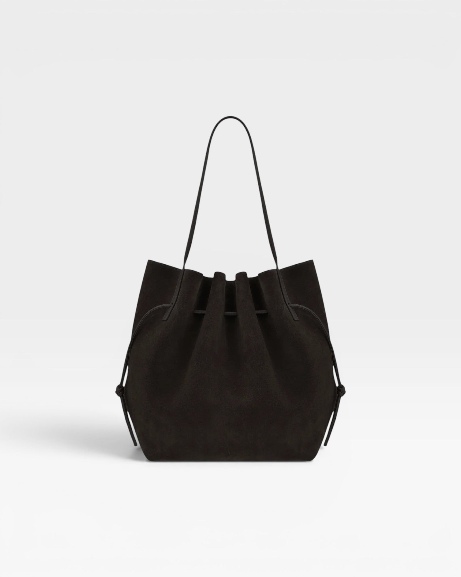JONES + CO Scallop Tote in rich ganache brown suede with a spacious design and elegant scalloped top edge.