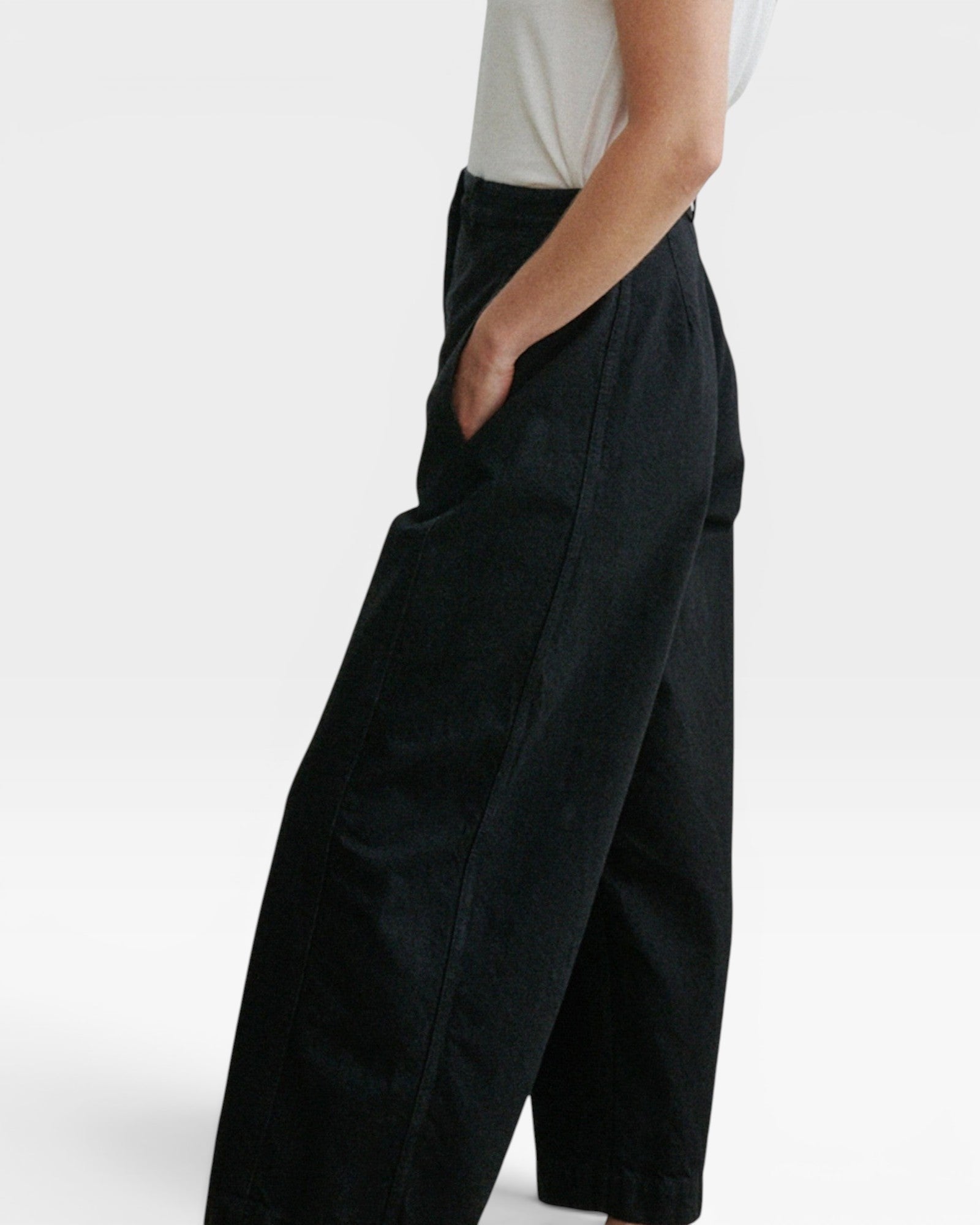 JONES + CO Garra high-waisted black denim jeans with a relaxed wide leg and contrast side panel detail