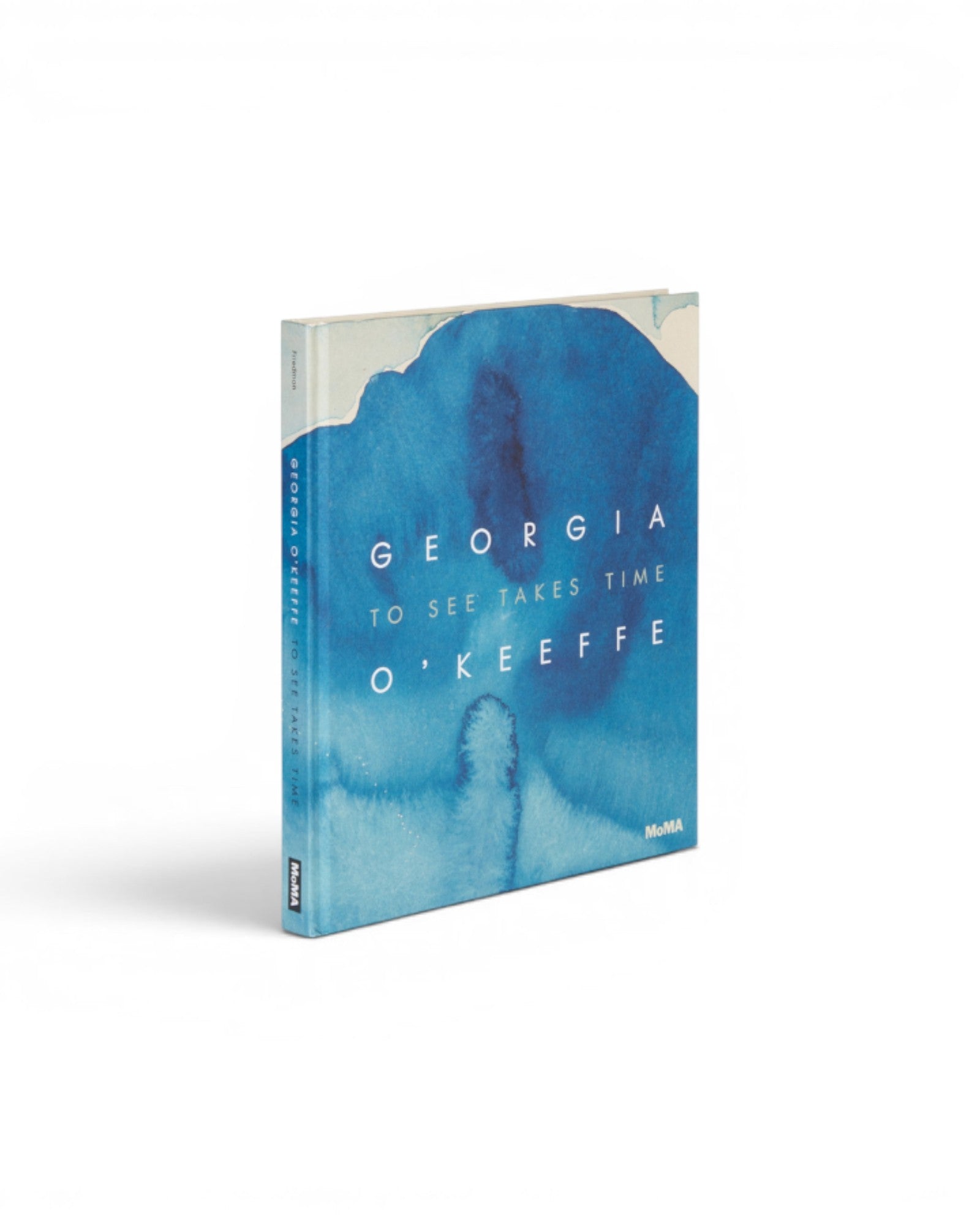 JONES + CO Georgia O’Keeffe To See Takes Time art book featuring a blue watercolor cover design