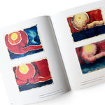 JONES + CO Georgia O’Keeffe To See Takes Time art book open to pages featuring colorful watercolor Evening Star series