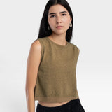 Model wearing a JONES + CO ginger boucle crop tank with delicate hand crochet edge detail on a white background.
