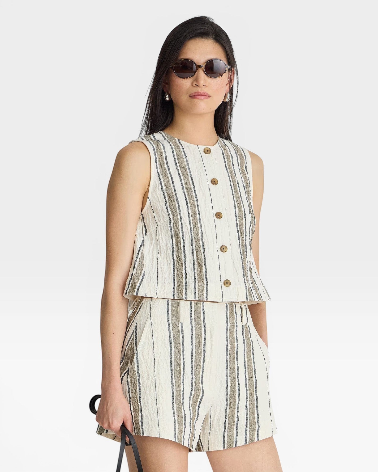 JONES + CO Godet Stripe Tank in off-white with brown and grey vertical stripes, button front, and textured fabric.