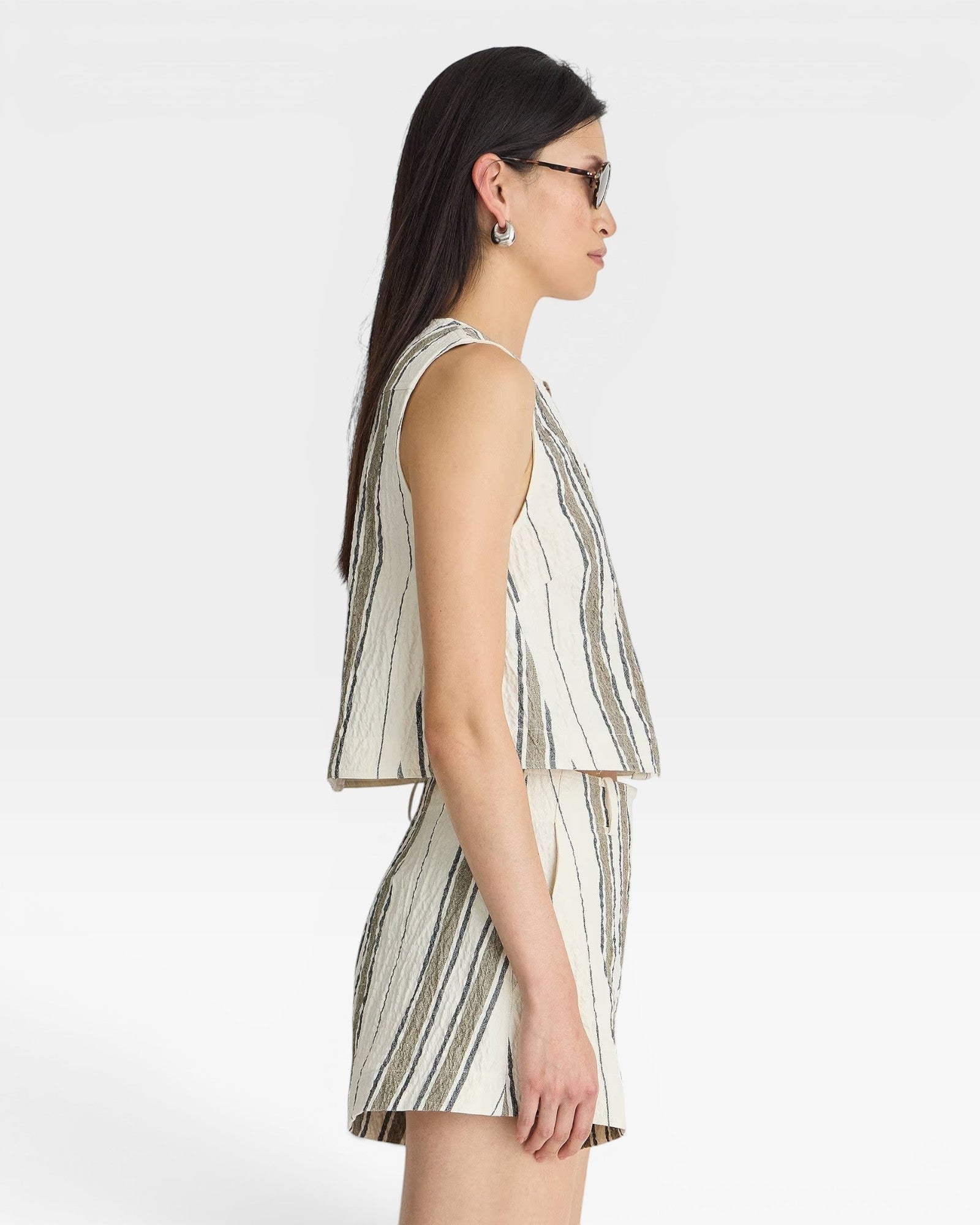 JONES + CO Godet tank top and shorts set in affogato stripe pattern. Sleeveless cropped top and high-waisted shorts.