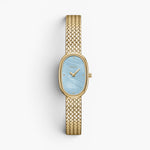 JONES + CO Jane Small watch with a gold woven mesh bracelet and an oval sky blue mother of pearl dial.