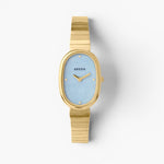 JONES + CO Jane watch with a 23mm gold oval case, sky blue mother-of-pearl dial, and gold-plated link bracelet.