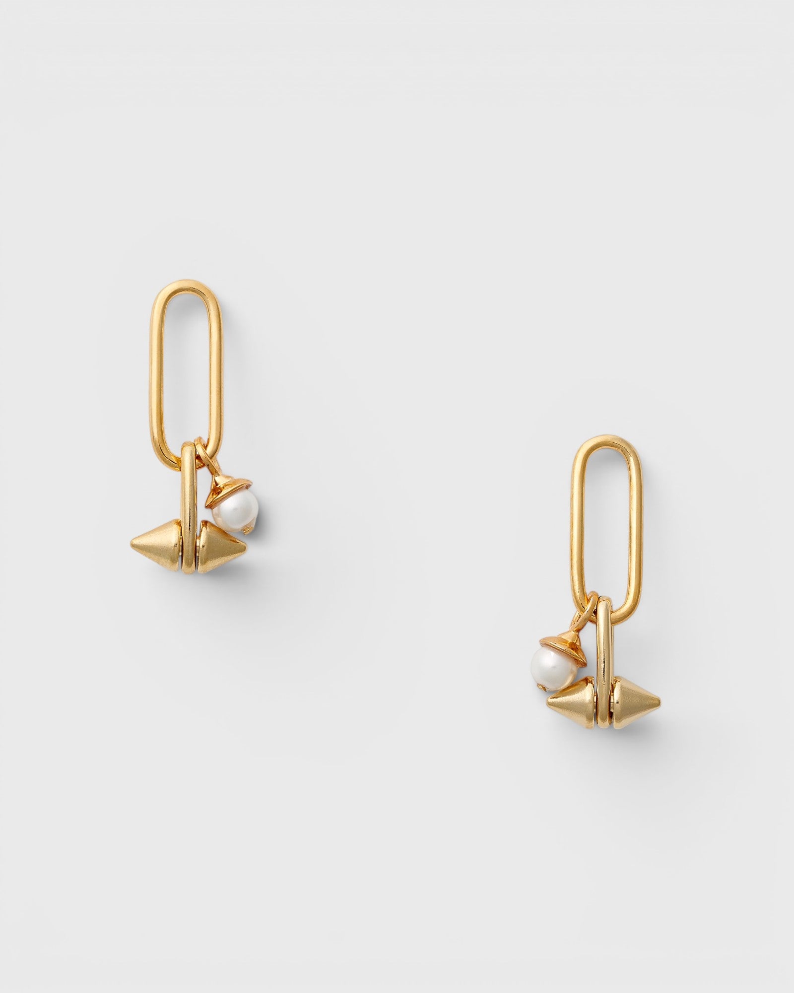 JONES + CO gold paperclip link earrings featuring a shell-based pearl and a punk-inspired spike detail.