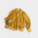 JONES + CO gold sheer button-up shirt with voluminous sleeves and a crinkled texture.