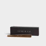 JONES + CO gold rechargeable USB arc lighter with its elegant black presentation box for luxury gifting.