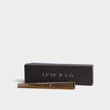 JONES + CO gold rechargeable USB arc lighter with its elegant black presentation box for luxury gifting.