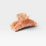 JONES + CO Grande Heirloom Claw in Blossom, a large hair claw clip made from Italian acetate in a marbled pink and cream pattern.