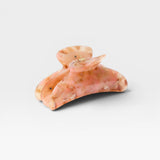 JONES + CO Grande Heirloom Claw in Blossom, a large hair claw clip made from Italian acetate in a marbled pink and cream pattern.