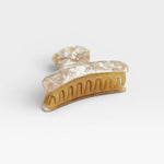 JONES + CO Grande Heirloom Claw Clip in marbled cream and amber tortoise shell acetate for thick hair.