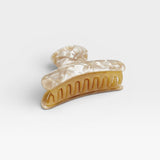 JONES + CO Grande Heirloom Claw Clip in marbled cream and amber tortoise shell acetate for thick hair.