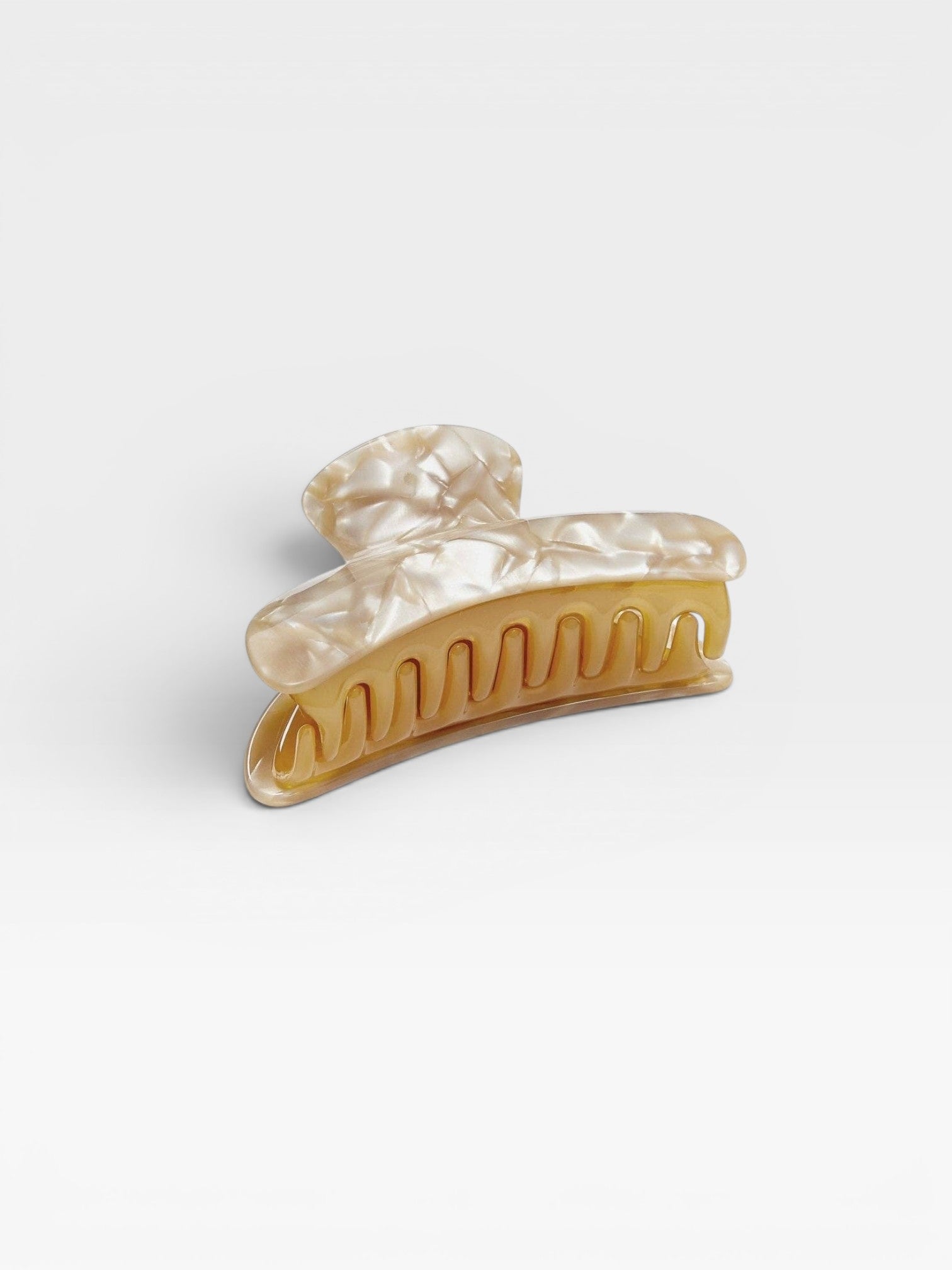 JONES + CO Grande Heirloom Claw Clip in marbled cream and amber tortoise shell acetate for thick hair.