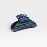 JONES + CO Grande Heirloom Claw Clip in blue and black striped acetate, ideal for thick hair and updos.