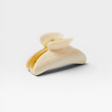 JONES + CO Grande Heirloom Claw Clip in marbled cream, perfect for updos and thick hair.