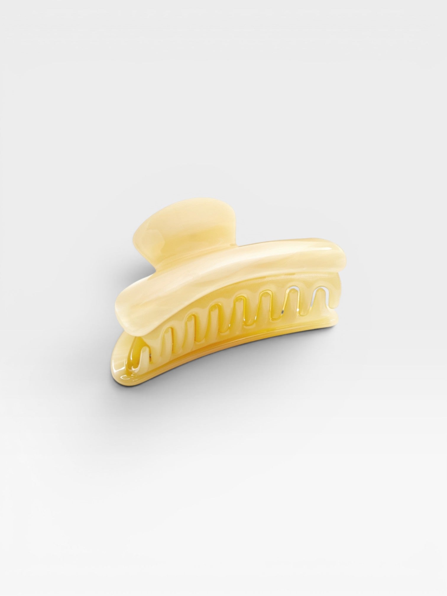 JONES + CO Grande Heirloom Claw Clip in pale yellow, ideal for thick hair updos.