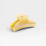 JONES + CO Grande Heirloom Claw Clip in pale yellow marbled acetate, perfect for thick hair updos.
