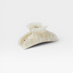 JONES + CO Grande Heirloom Claw Clip in pearlescent white, perfect for thick hair updos.