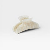 JONES + CO Grande Heirloom Claw Clip in pearlescent white, perfect for thick hair updos.