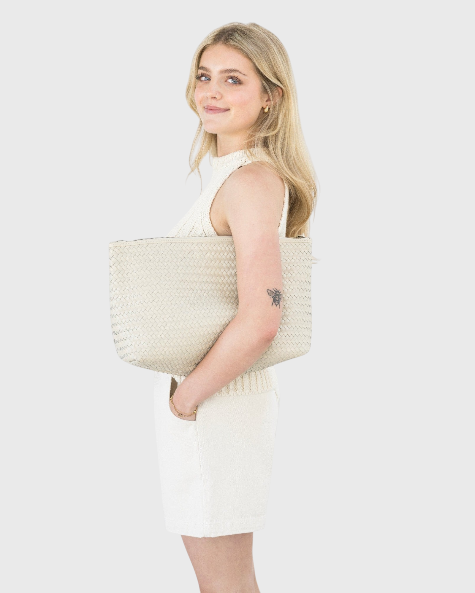 JONES + CO Grande Pouche in cream woven leather, a large zip clutch that can fit an iPad or shoes.