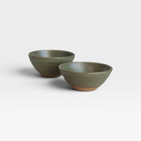 JONES + CO handcrafted green ceramic little bowls with a rustic exposed clay base for home decor or serving snacks.