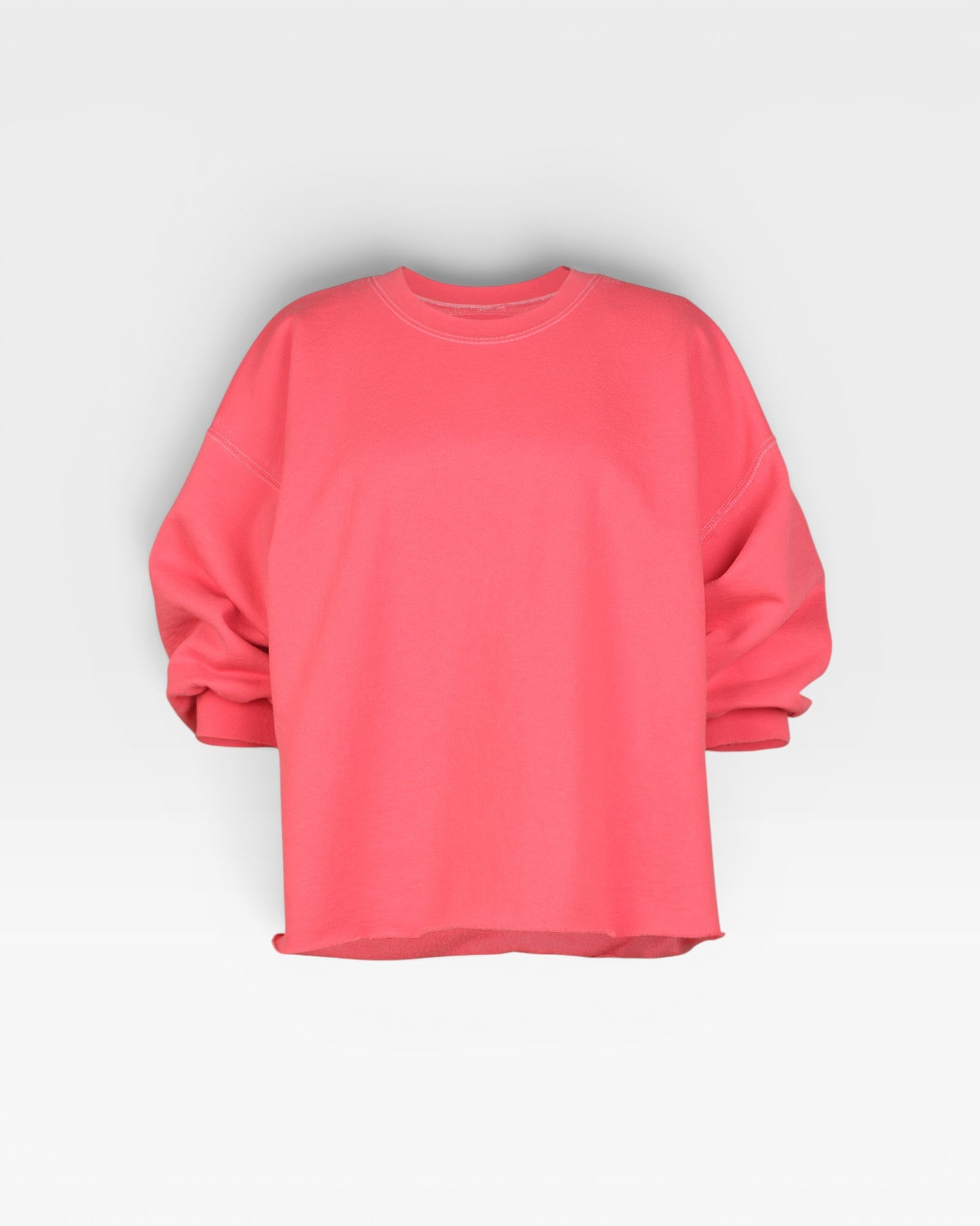 JONES + CO Fond crewneck sweatshirt in guava pink with drop shoulders, cropped sleeves, and a raw edge hemline.