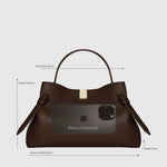 JONES + CO Gyoza Mini handbag in sierra brown embossed Italian leather with gold-tone hardware and top handle.