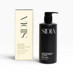 JONES + CO black matte bottle of The Hand Exfoliant with bergamot and vetiver scent, alongside its cream box.