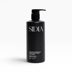 JONES + CO black matte bottle of The Hand Exfoliant with pump, featuring Bergamot & Vetiver scent.