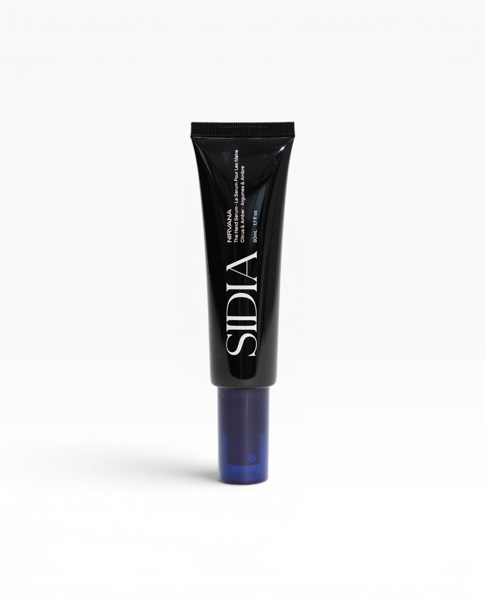 JONES + CO The Hand Serum in Nirvana scent, a black tube with blue cap, featuring cactus blossom, bergamot, and vanilla amber notes.