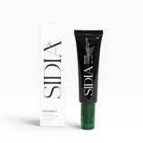 JONES + CO SOAKED Hand Serum in black tube with green cap, featuring Juniper, Cypress, and Musks scent.