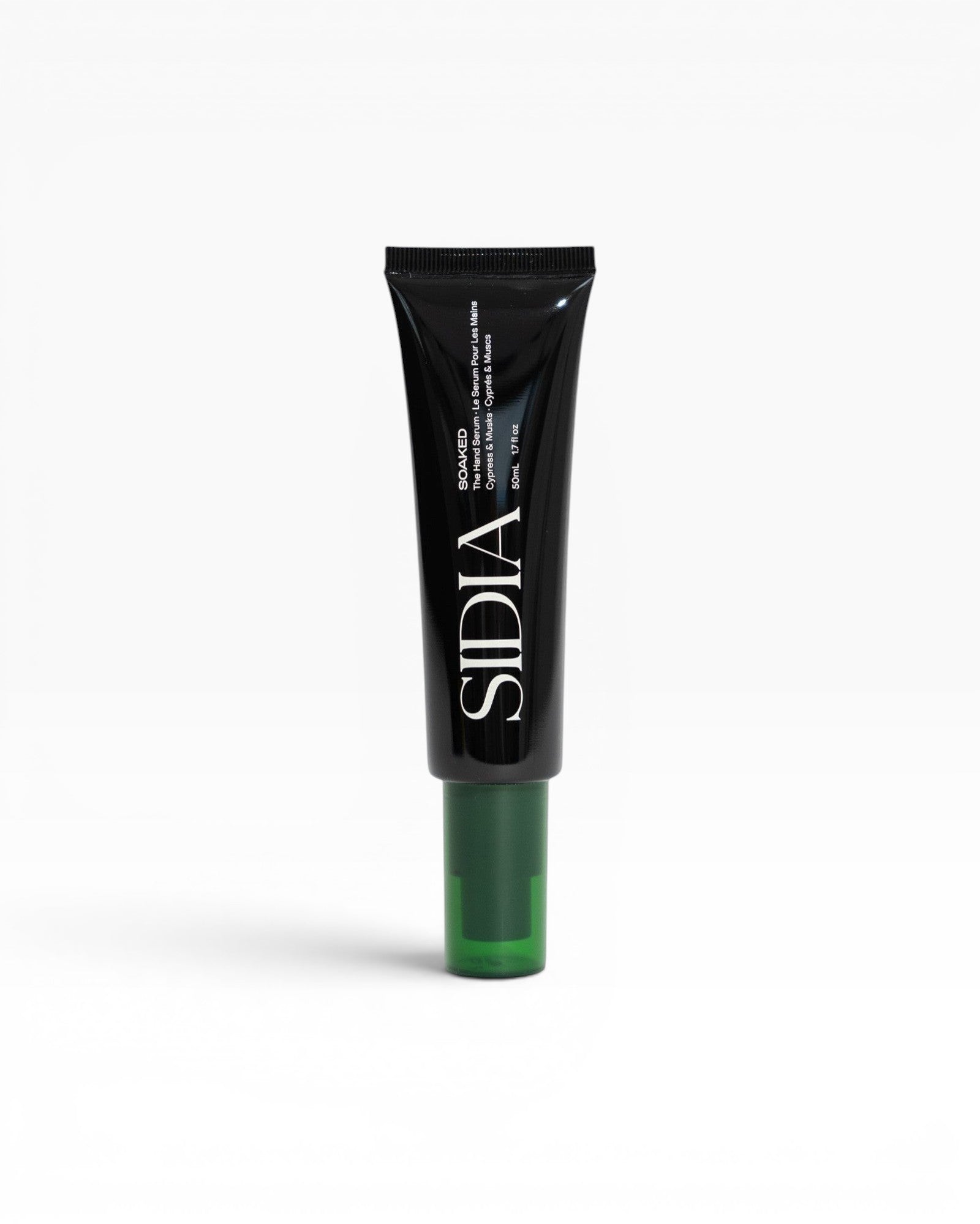 JONES + CO SOAKED Hand Serum with Juniper, Cypress, and Musks. Lightweight, fast-absorbing formula.