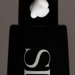 JONES + CO The Hand Serum in WIRED fragrance, a lightweight, fast-absorbing serum with a dollop on the pump.