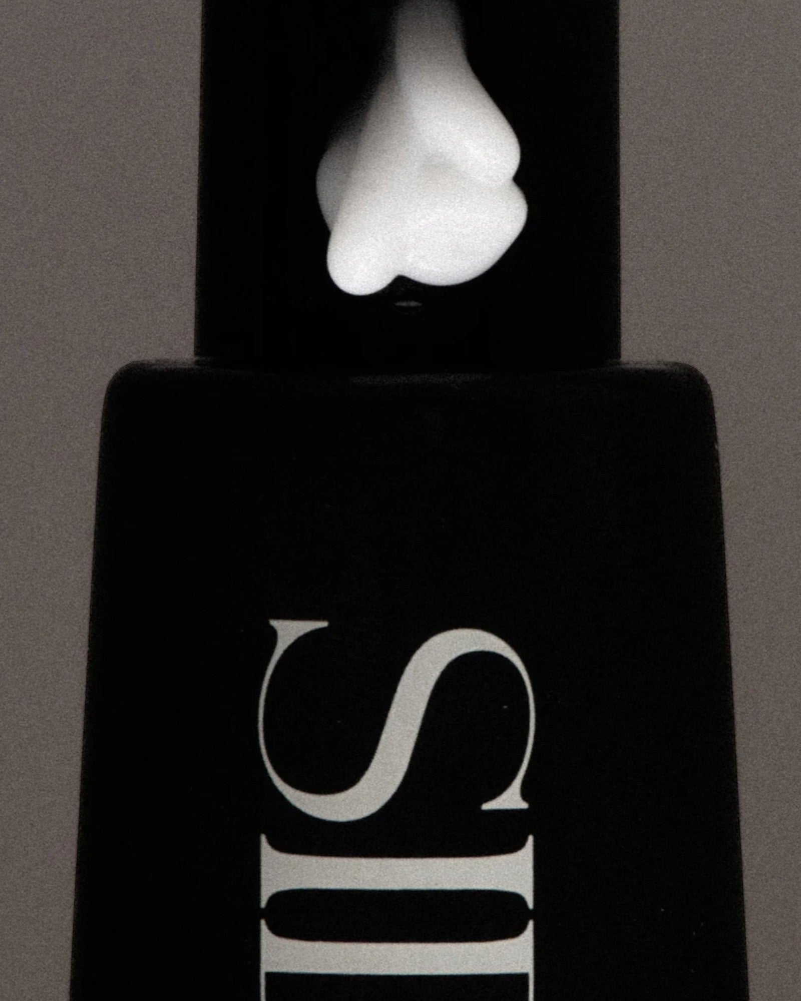 JONES + CO The Hand Serum in WIRED fragrance, a lightweight, fast-absorbing serum with a dollop on the pump.