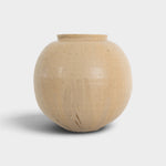 JONES + CO handthrown ceramic vase in a round, beige speckled glaze, perfect as a sculptural home decor piece.