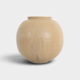 JONES + CO handthrown ceramic vase in a round, beige speckled glaze, perfect as a sculptural home decor piece.