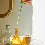 JONES + CO handwoven natural junco petite basket with handles, ideal for decorative storage or gifting.