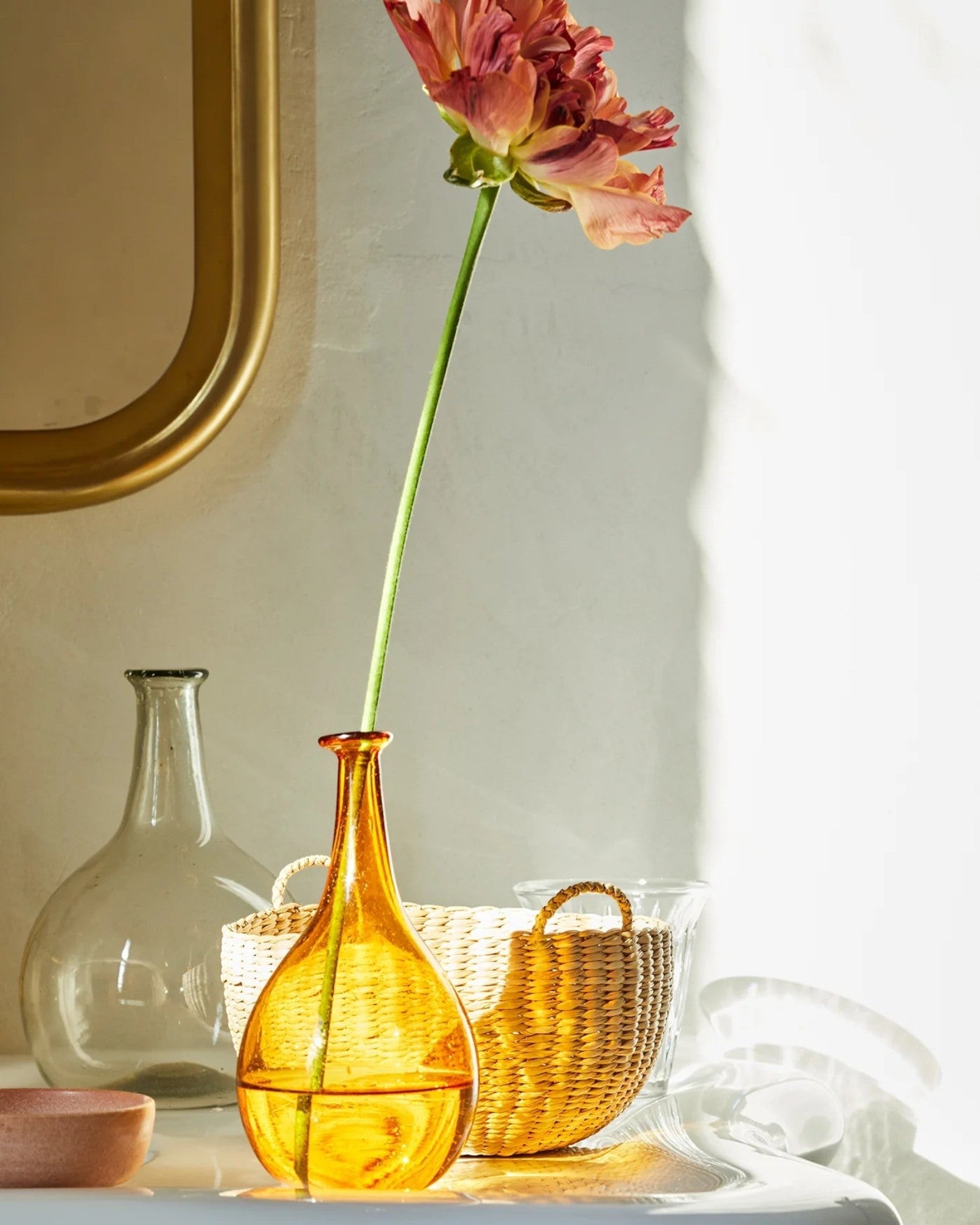 JONES + CO handwoven natural junco petite basket with handles, ideal for decorative storage or gifting.