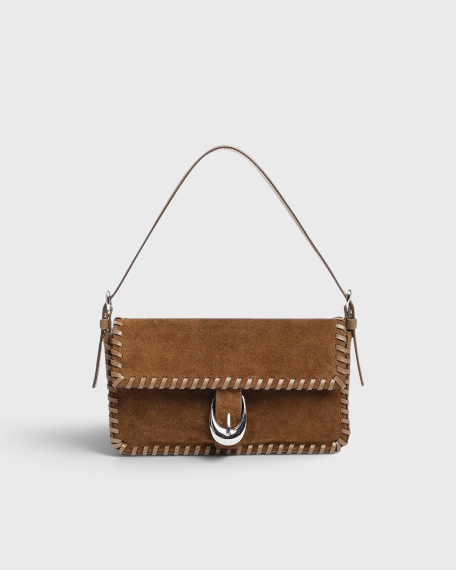 JONES + CO Harlow shoulder bag in cigar brown suede with leather whipstitch trim and a silver front buckle.